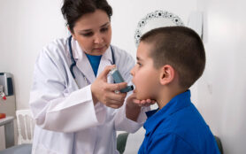 Medical,Doctor,Applying,Oxygen,Treatment,On,A,Little,Boy,With